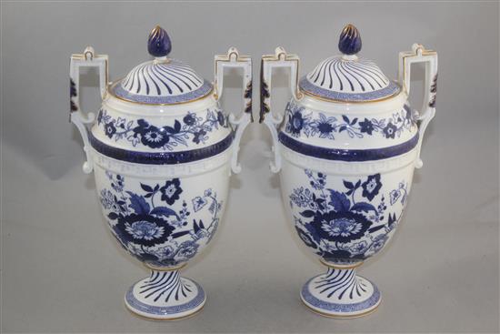 A pair of Copeland blue and white bone china oviform vases and covers, late 19th century, 30cm